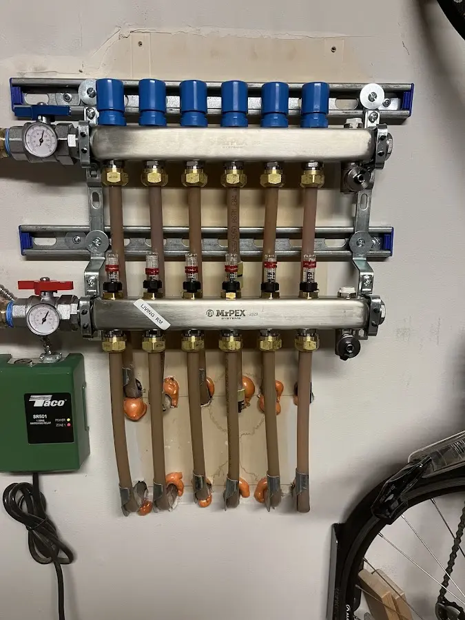 Plumber performing Gas Line Installation at a residential property in Alaiedon